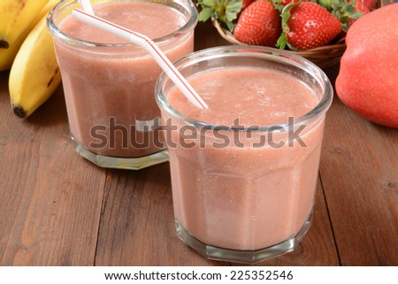 Fruit smoothies with strawberries, apples and bananas