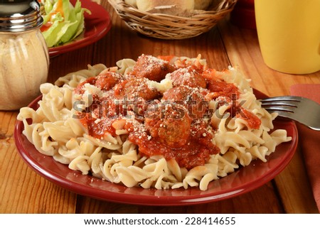 Italian meatballs and marinara sauce on gluten free brown rice and quinoa fusilli pasta
