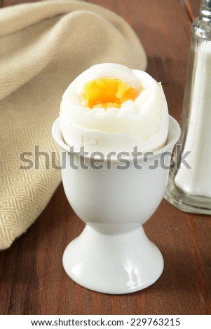 A three minute egg in an egg holder