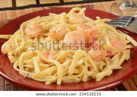 Shrimp scampi on linguine in a garlic butter sauce