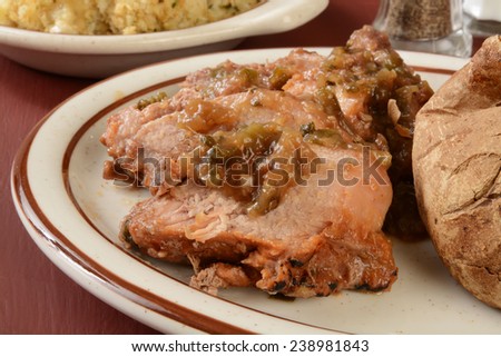 Succulent juicy pork shoulder roast with a ginger scallion sauce