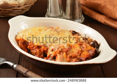 A dish of eggplant parmesan with meat