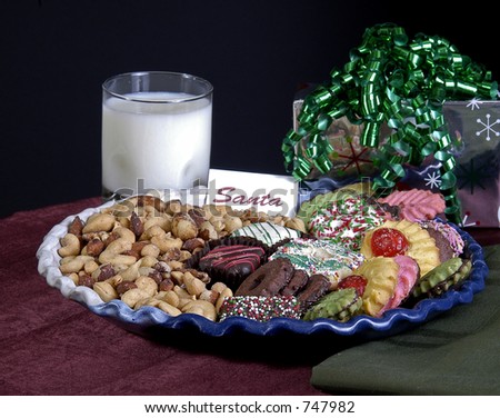 Cookies, milk and a gift are left out for Santa on Christmas Eve