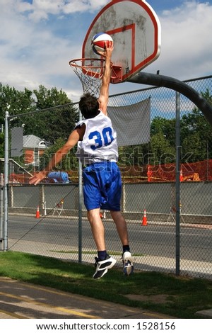Basketball player makes a jump shot