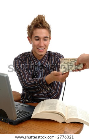 A man behind a computer being handed money
