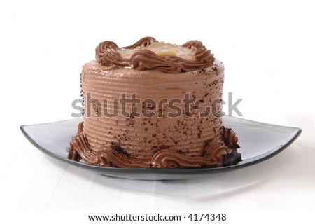 A delicious German chocolate cake on a white placemat