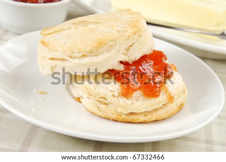 a fresh baked biscuit with jelly