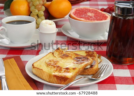 Breakfast of french toast with butter