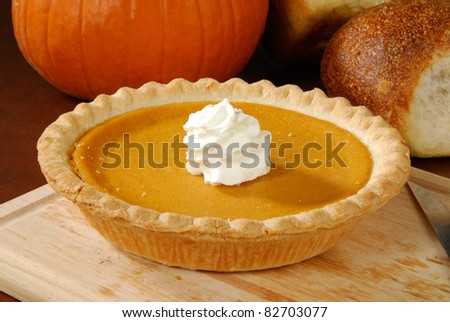 A fresh pumpkin pie, a Thanksgiving or holiday treat