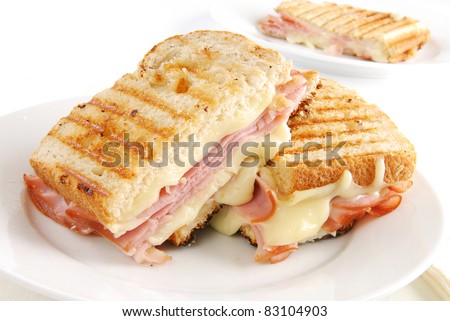 A grilled ham and swiss cheese sandwich