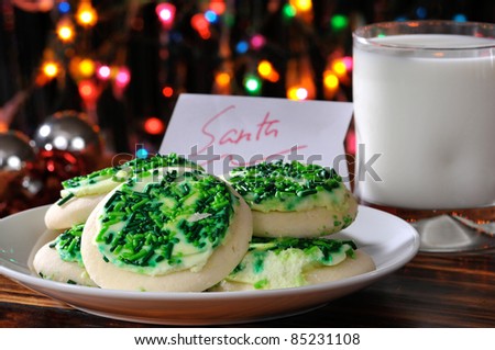 A plate of Christmas cookies and a glass of milk left out for Santa Claus