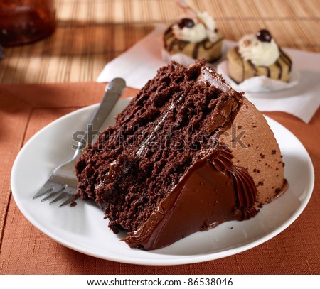 Definition of "rich" Stock-photo-a-slice-of-rich-moist-devil-s-food-chocolate-cake-photographed-with-a-mp-phase-one-camera-86538046