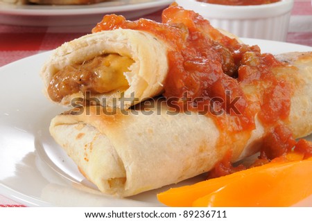 Closeup of steak and cheese chimichangas