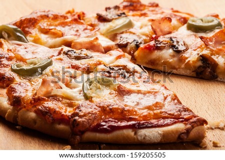 Pizza with cheese ham and jalapeno pepper Pizza with cheese ham and jalapeno pepper