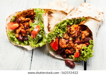 [Obrazek: stock-photo-burrito-tortilla-with-meat-a...555422.jpg]