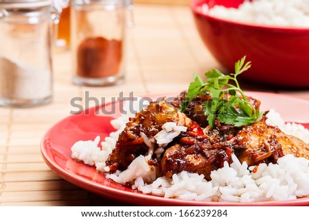Sweet and sour pork and rice on a plate
