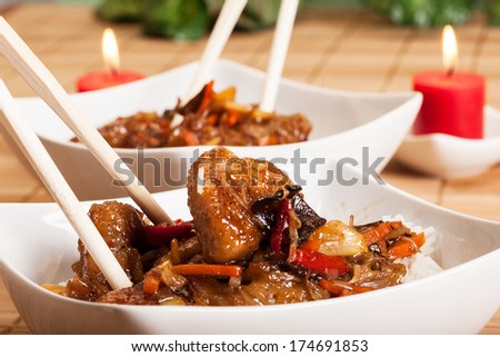 Sweet and sour pork and rice in a bowl