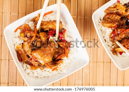 Sweet and sour pork and rice in a bowl
