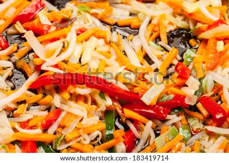 Close-up of fresh chinese vegetable in a wok pan