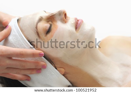 a woman relaxes during a beauty treatment