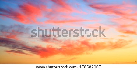 sunset sky only with pink clouds and orange and blue sky