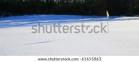 golf course covered in snow