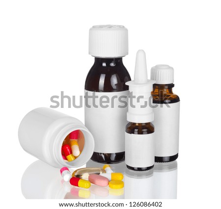 Medical bottles and pills isolated on white Medical bottles and pills isolated on white