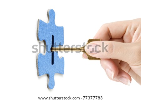key in hand opening lock in puzzle