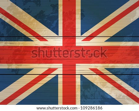 grunge union jack on a wooden background