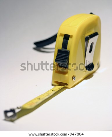 Close-up of a  yellow Tape Measure - Shallow depth of field