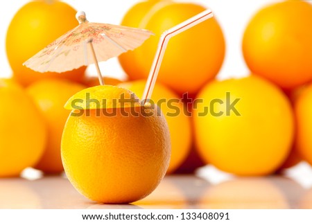 Picture of an orange-goblet with umbrella isolated on white background. studio shot