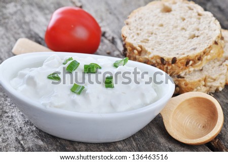 Cottage cheese on  a wooden table