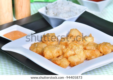 Crispy fried shrimp on plate (tempura).