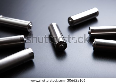 The batteries on a black background, an independent source of energy.