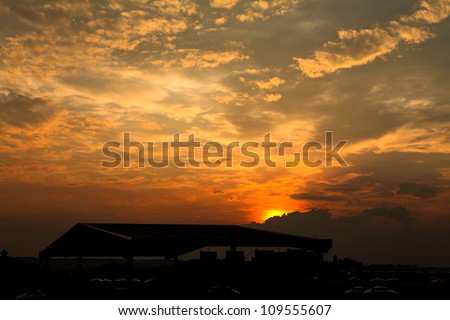House silhouette with gorgeous sunset sky background