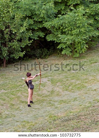 KYIV, UKRAINE - MAY 26: A player of the role-playing game representing a young archer woman at the celebration of The Day of Kiev on May 26, 2012 in Kyiv, Ukraine. It\'s 1530 years since the foundation