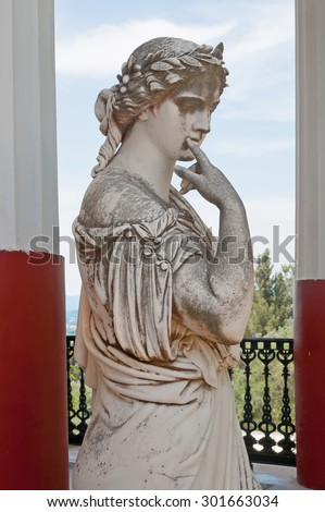 Statue of a Greek mythical muse in the balcony of Achilleion palace in Corfu, Greece