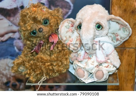 KIEV, UKRAINE - MAY 22: Collectible toys, which resemble fun animals, are on display at the Kyiv Fairy Tale exhibit in the 2nd annual International Doll Salon on May 22, 2011 in Kiev, Ukraine.