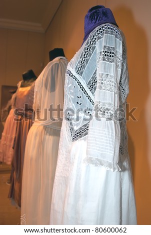 KIEV, UKRAINE - APRIL 16: Three original woman dresses are on display at the museum exhibit of Marina Ivanova\'s private collection of antique woman\'s clothes on April 16, 2011 in Kiev, Ukraine.