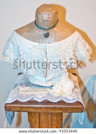 KIEV, UKRAINE - APRIL 16: An woman bust with lacy corsage on display at the museum exhibit of Marina Ivanova\'s private collection of antique woman\'s clothes on April 16, 2011 in Kiev, Ukraine.