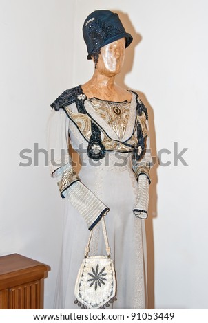 KIEV, UKRAINE - APRIL 16: An original gray woman dress is on display at the Marina Ivanova\'s private collection exhibit on April 16, 2011 in Kiev, Ukraine.