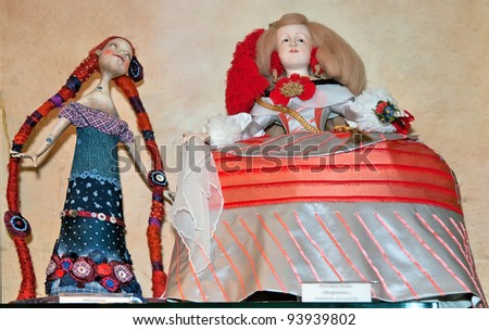 KIEV, UKRAINE - JANUARY 09: Collectible dolls which resemble Velázquez Spanish infanta and unknown doll, are on display at the Angel Age exhibit of Author\'s Dolls on January 09, 2012 in Kiev, Ukraine.