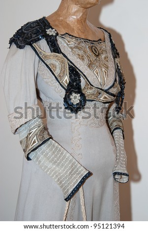 KIEV, UKRAINE - APRIL 16: An original gray woman\'s dress detailed is on display at the Marina Ivanova\'s private collection exhibit on April 16, 2011 in Kiev, Ukraine.