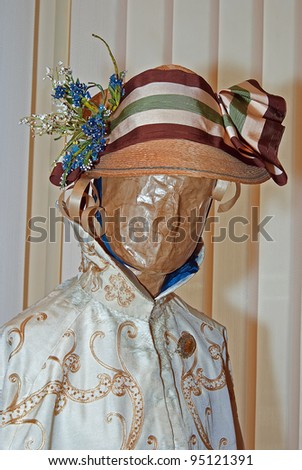 KIEV, UKRAINE - APRIL 16: An original woman\'s tippet and hat are on display at the museum exhibit of Marina Ivanova\'s private collection of antique woman\'s clothes on April 16, 2011 in Kiev, Ukraine.