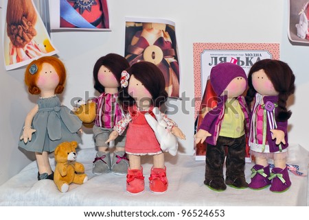 KIEV, UKRAINE - FEBRUARY 26: Collectible dolls, which resemble a friends company, are on display at the Fashion Doll International exhibit on February 26, 2012 in Kiev, Ukraine.