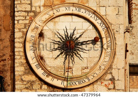 stock-photo-beautiful-old-clock-tower-in-the-sun-47379964.jpg