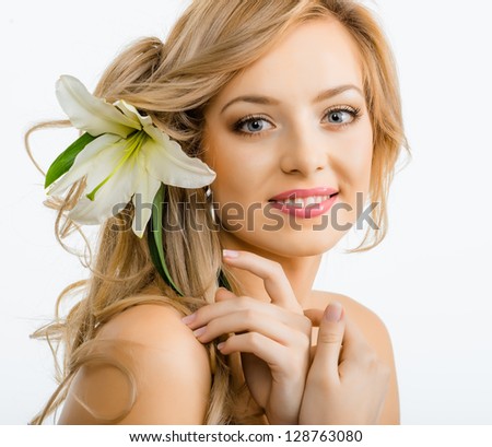 stock-photo-beautiful-smiling-woman-with-a-lily-128763080.jpg