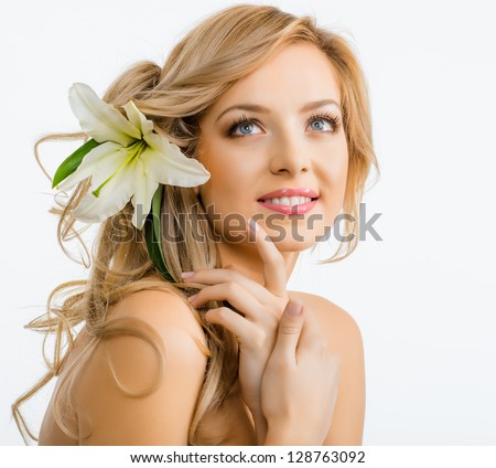 Beautiful Smiling Woman With A Lily