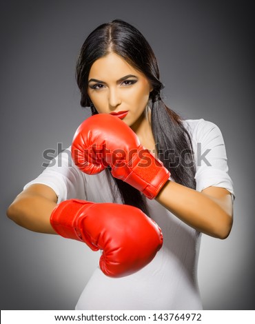 beautiful woman in boxing gloves