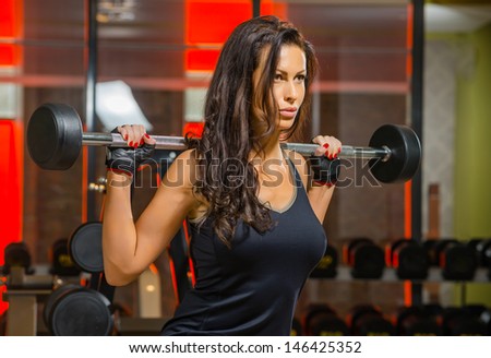 Attractive Young Woman Is Engaged In Fitness Sport Club